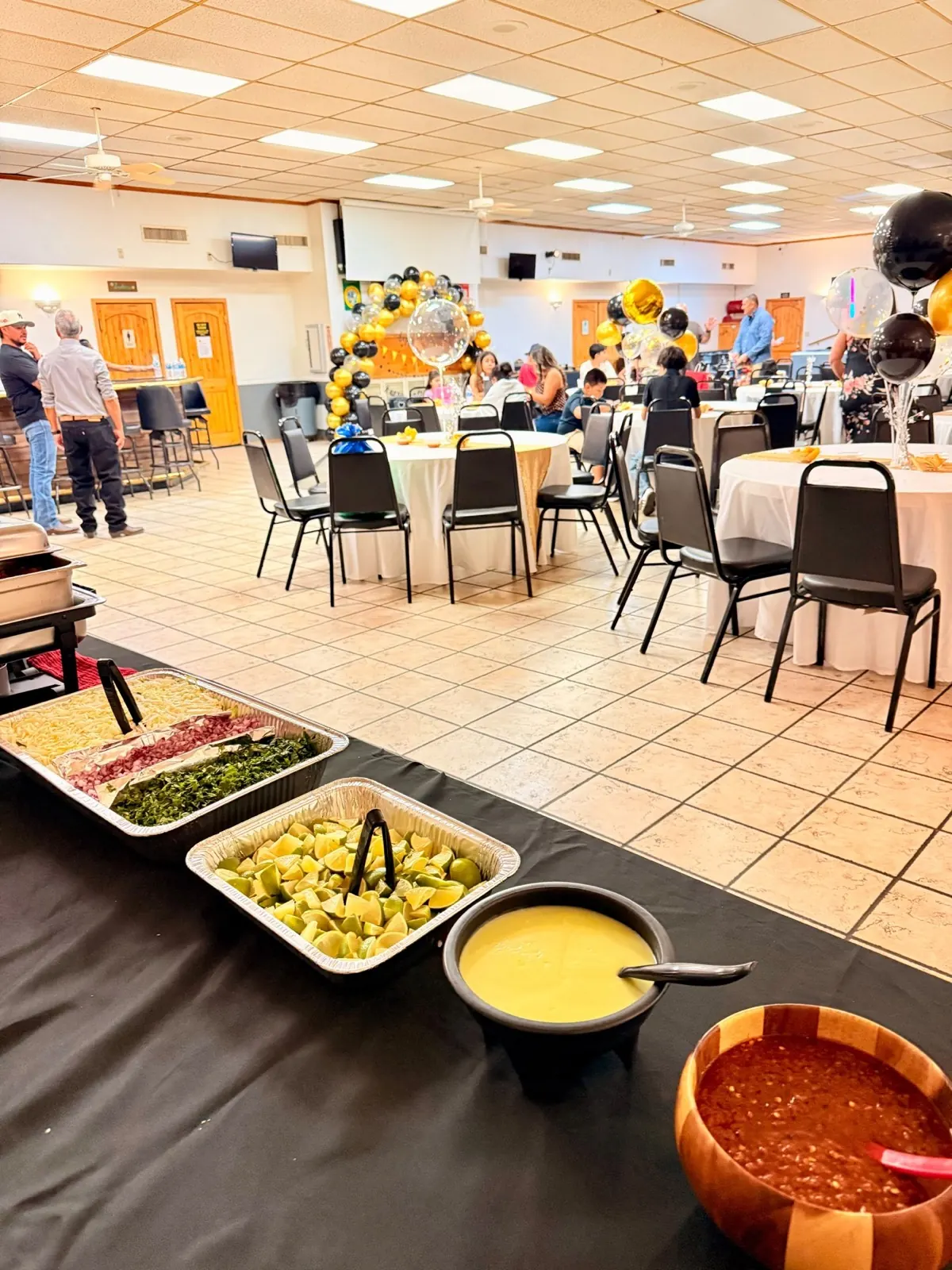 A catered Tastee Meals buffet set up at a local Yuma event